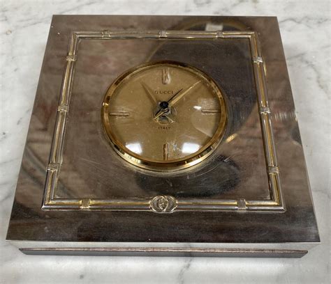 gucci table clock wall.